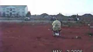 Fat kid on Moped