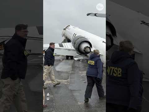 See the moment an Air Canada jet crashes into a fire truck at New York's LaGuardia Airport