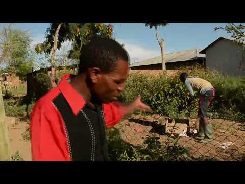 Goodluck Gozbert surprise cover scene behind