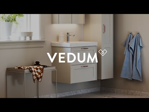 Vedum Kök & Bad - Modernt badrum med klassiska detaljer