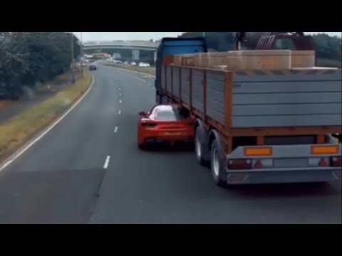 The truth | Ferrari under truck.