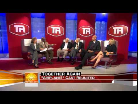 Leslie Nielsen and other cast members of Airplane! reunite.