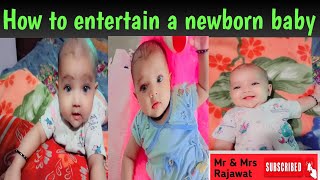 How to entertain a newborn baby ? how to play with newborn ?
