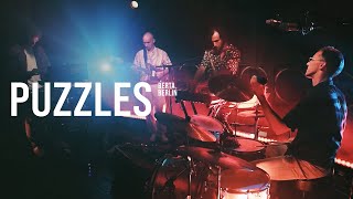 PUZZLES<br />LIVING IN A BOX live at Club Gretchen