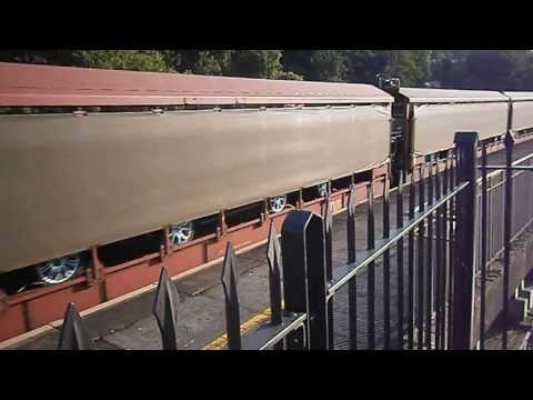 DB Schenker Class 66 no: 66055 @ Bath Spa With A Car Train.