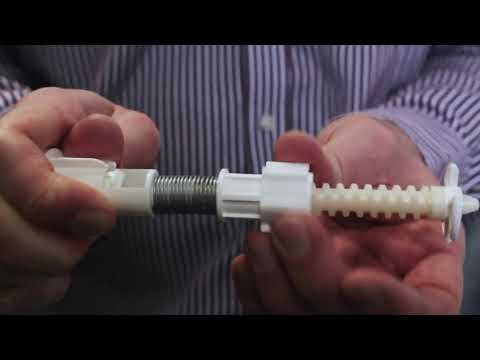 Part of a video titled How to Tension a Cordless spring action Roller Blind - YouTube
