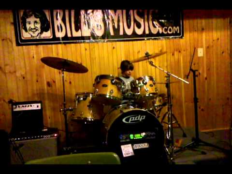 Andrew playing AC/DC on drums