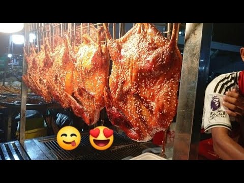 Only $3.50 for one yummy grilled duck that selling by young man at Dumex Market, Phnom Penh City 😋😍 