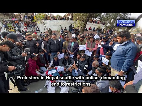 Protesters in Nepal scuffle with police, demanding end to restrictions