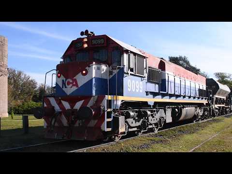 [4K] Tren cargado de NCA con la EMD GT-22CW 9099 pasando por Marcos Juárez!!!!!!
