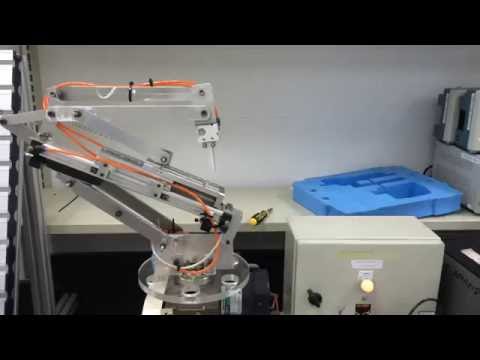 Three axes articulated Pneumatic Robotic Arm controlled using PLC