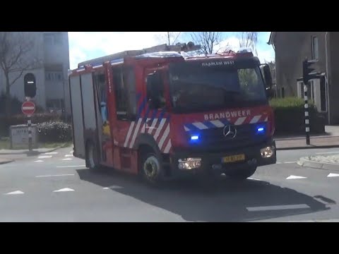 open rolluik brandweer Tankautospuit Haarlem west 123030 met spoed naar een brand in Haarlem