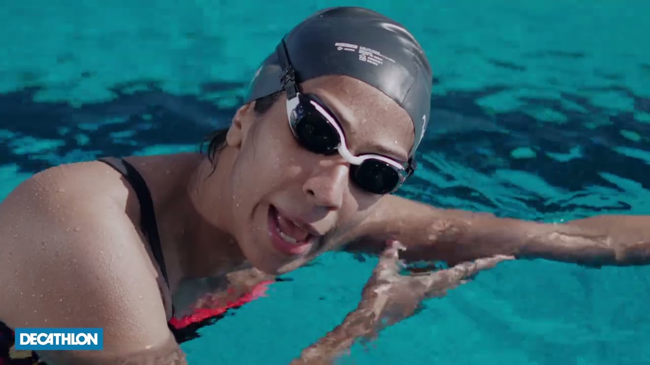 How should you breathe on your side when swimming