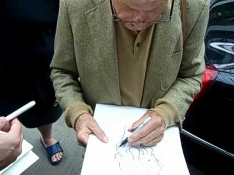 Dick Van Dyke Signing Autographs & Drawing Self Portraits for us at Aiport