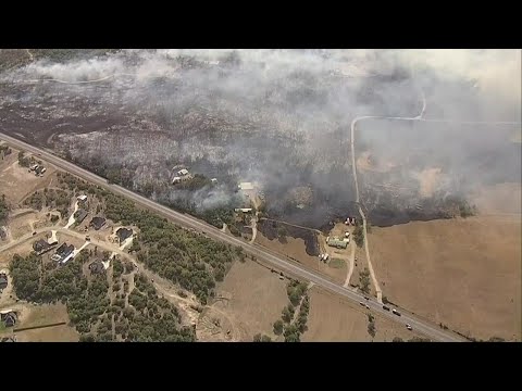 Parker County crews working to put out large grass fire