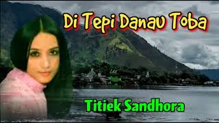 Download lagu DI TEPI DANAU TOBA - Titiek Sandhora mp3 Download lagu DI TEPI DANAU TOBA - Titiek Sandhora mp3