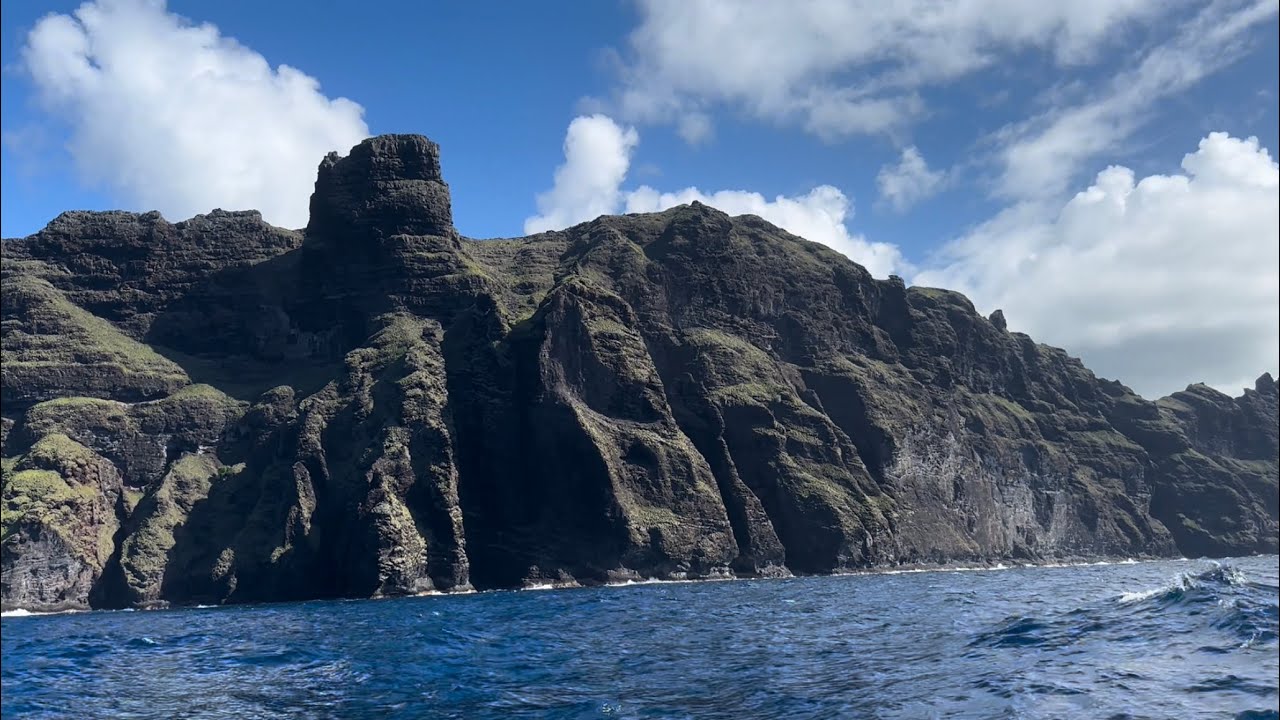 Jeanne sails from dramatic Anaho Bay to Taiohae Bay on Nuku Hiva in French Polynesia