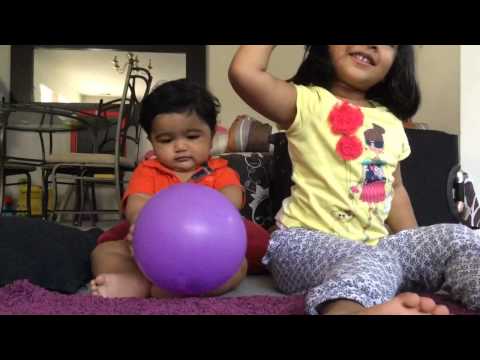 Zara and Zuhair playing with balloons