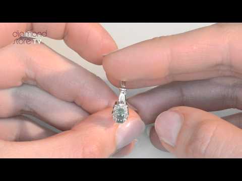 E5753 - 0.27ct Emerald And Diamond Ring