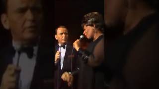 Dance along to Frank Sinatra and Ella Fitzgerald’s performance of “The Lady Is A Tramp”. 🪩🎶