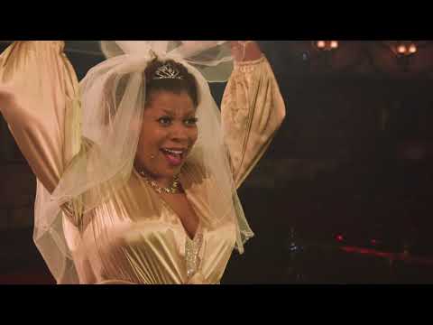 Trailer montage: wedding photos, car seats, and a senior center dance—matching the revue’s cradle-to-couple-to-encore arc