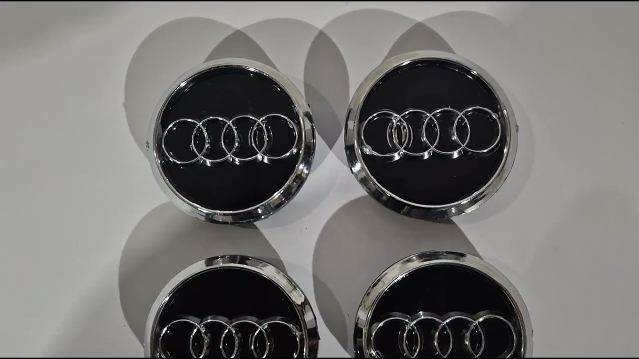 Audi Středové krytky do disků 60/58 mm (černé s chromem, 4 ks) Video 1