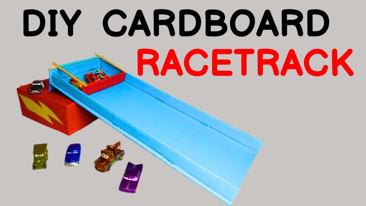 Cardboard race track for cars. DIY children's toys DIY World