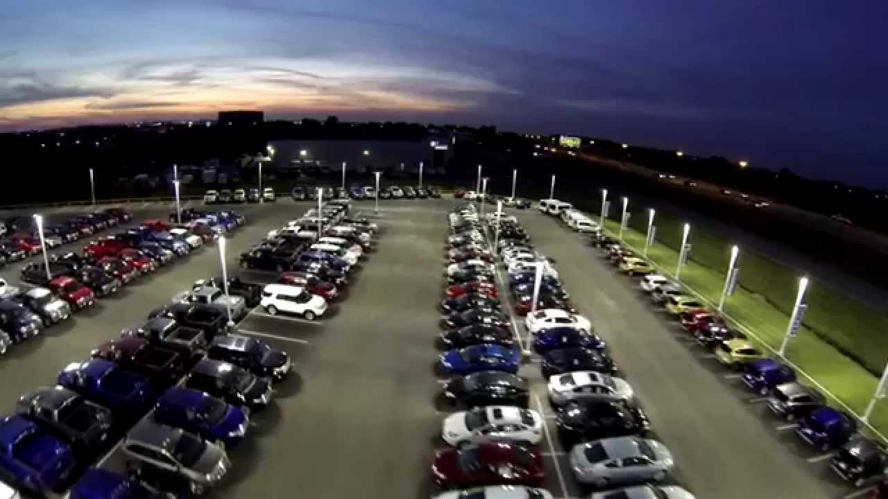 ( Tulsa Corporate Video) BridgePoint Electric shows a comparison on new lights on a car lot