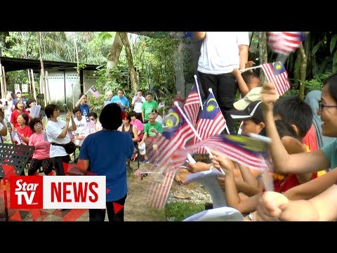 Singing in the park: Malaysians unite to sing patriotic songs