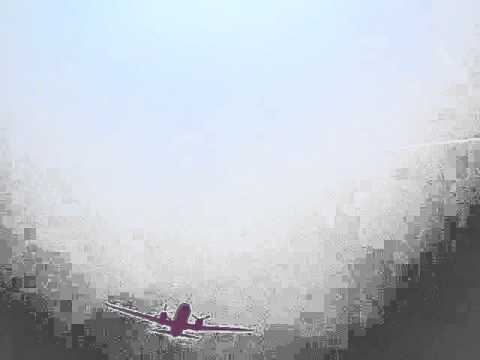 Convair 340 Flying low over field