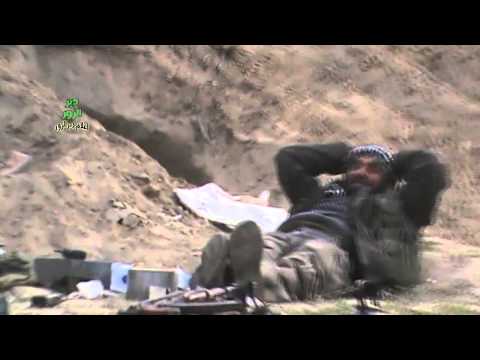 تمركز عناصر لواء محمد الباقر التابع لجيش القادسية في قرية الجفرة في ريف دير الزور