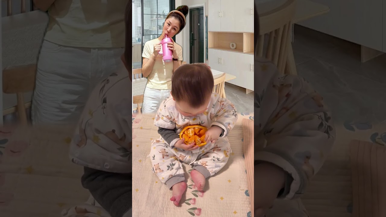 Mom Feeding Baby Orange for the First Time #babyreaction #wholesome #trending #cute