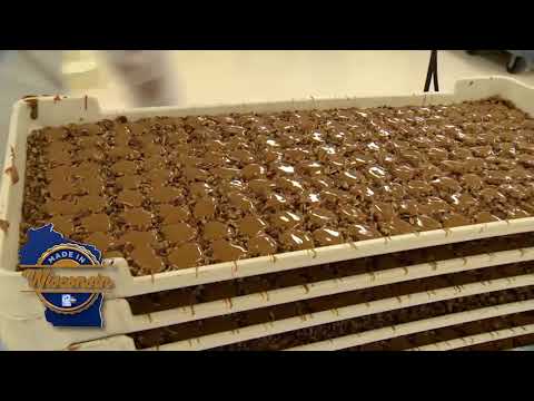 Making the candy:  Buddy Squirrel shows 12 News how it makes pecan tads