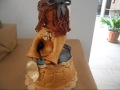 " LA MENINA DE BARRO"