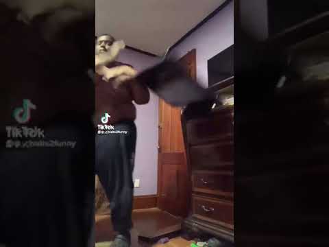 guy dancing breaks his tv and door