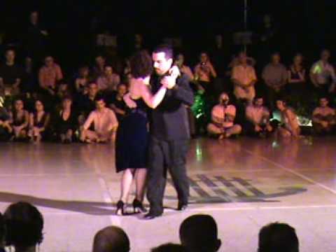  Vilma Fabiana Vega  and  Fernando Galera  are  dancing  to  a  milonga