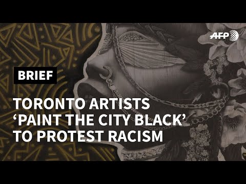 Toronto graffiti artists "paint the city black" against racism | AFP
