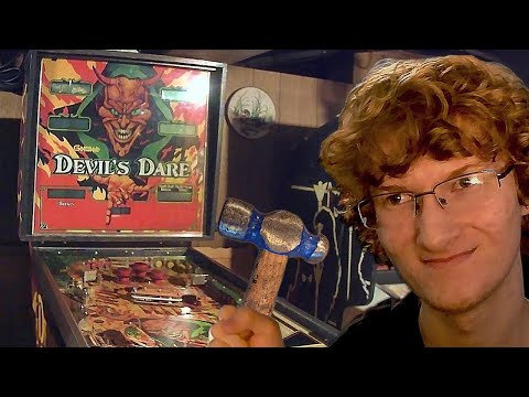 Doing Repairs on A Pinball Machine