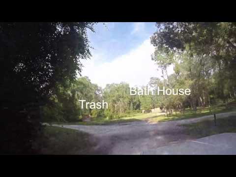 Driving into the campgrounds past the trash and bathhouse.