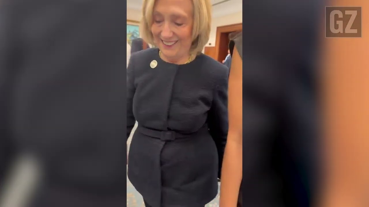 Aaron Mate confronts Hillary Clinton