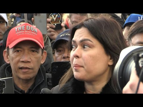 Sara Duterte speaks outside the ICC the day her father's hearing opens | AFP