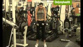 Dumbbell shrugs to strengthen the back