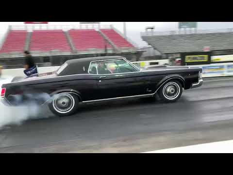 Thumbnail for 9 second Lincoln Continental Takes Out Mclaren 570s in a drag race at Houston Raceway Park