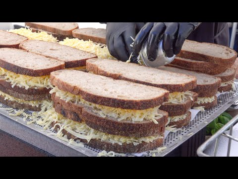 Melted Cheese and Sausages Yummy Sandwiches. London Street Food