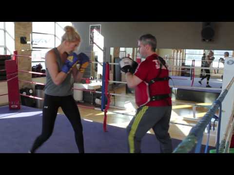 Klara Svensson working the pads with coach Joey Gamache