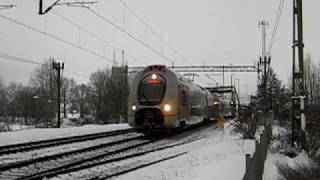 preview picture of video '[SJ] class X40 double decker regional train to Stockholm C. crossing the Göta Kanal canal bridge.'