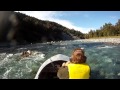 Jet boating up the Cascade river , westland , New Zealand