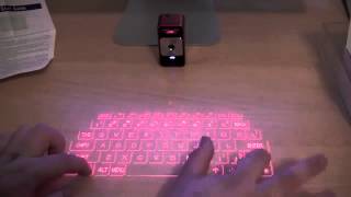 Celluon Magic Cube Projection Keyboard)