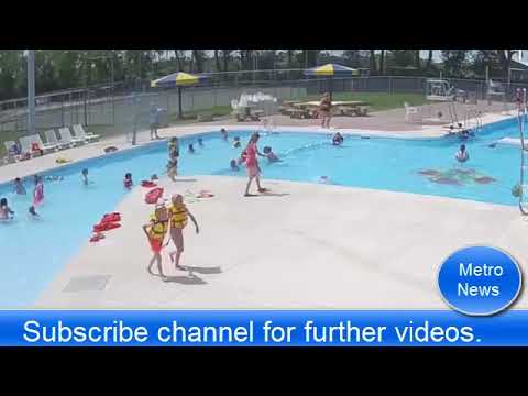 Moment life guards spots drowning boy and saves him