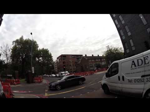 Insane Cyclist blasts through red light